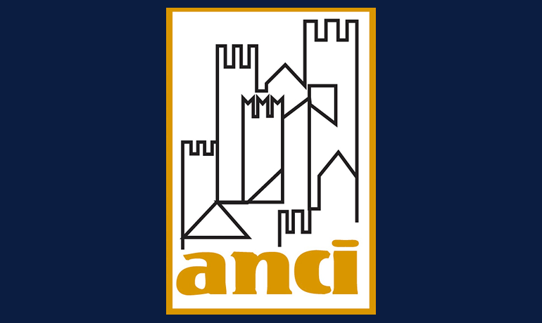 Logo assemblea anci composto da un castello stilizzato e la scritta anci