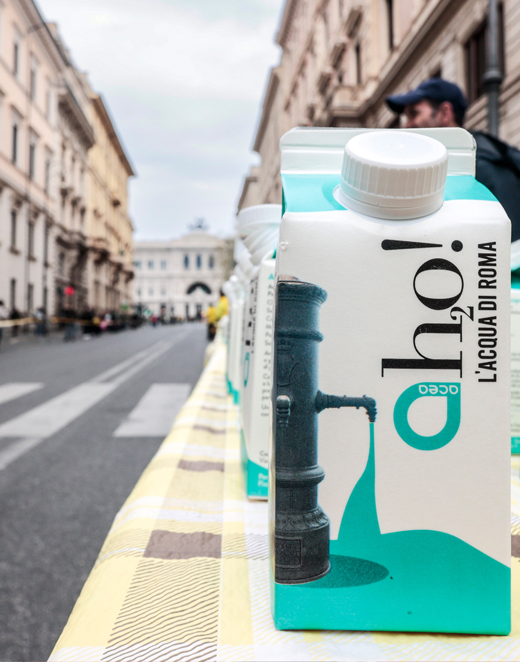 Close-up of an AH2O water carton! Featuring a nasone and the Acea logo in the foreground