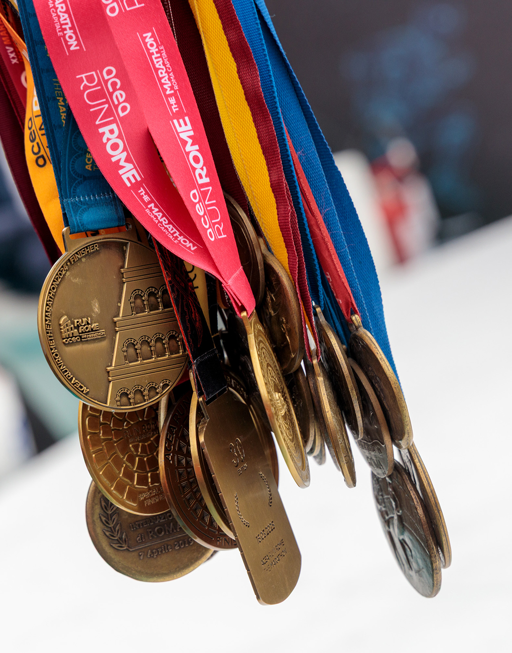 some medals from the 2026 Rome Marathon