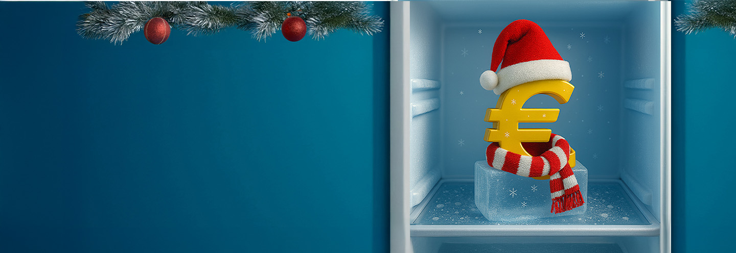 Simbolo dell'euro in abiti natalizi nel congelatore